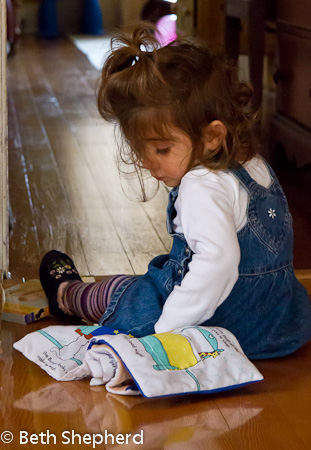 A baby and her books 9