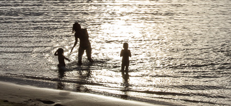 At play Ke'e Beach sunset