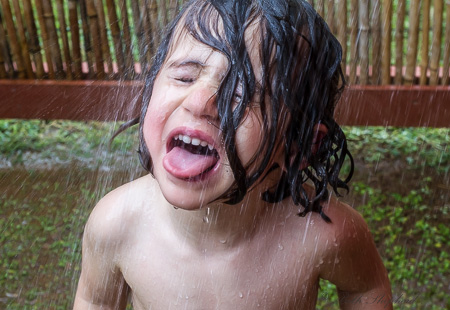 Tongue out in the Kauai outdoor shower