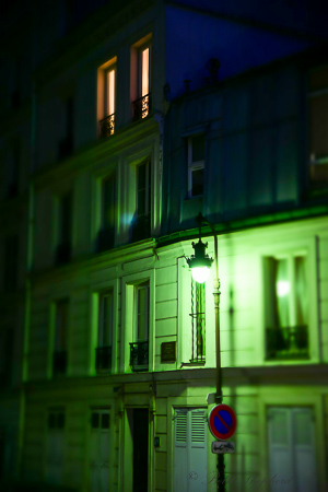 Green Paris building at night